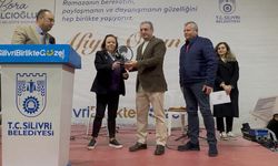 Demir'e teşekkür plaketi