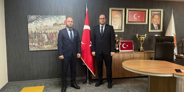 MHP'den Pamuk'a tebrik ziyareti