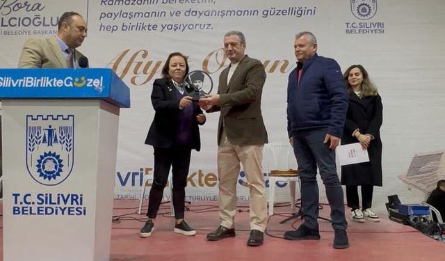 Demir'e teşekkür plaketi